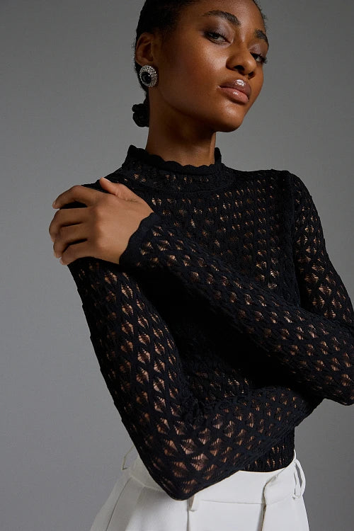 Blusa cutwork