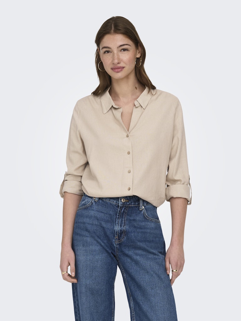 Blusa fluida de manga larga con botones