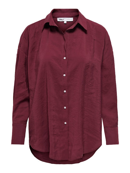 Camisa fluida de corte recto con botonadura frontal